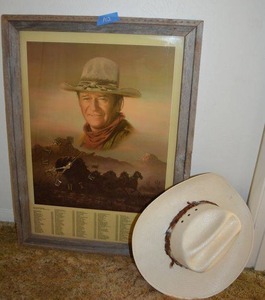 lot 102 image: John Wayne wall clock picture and straw hat