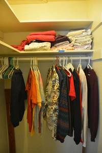 lot 110 image: Mens shirts and sweaters plus bed sheets