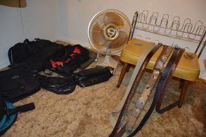 lot 130 image: Travel bags, fan, mens belts, shoe rack and vintage stool