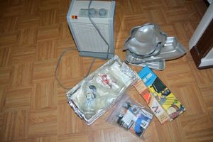 lot 150 image: Vintage glasses, batteries, personal heater, Cartoon character cake pans, Fondue forks and sharpening rods