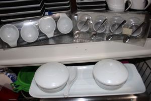 lot 67 image: Bowls, plater, and sauce cups