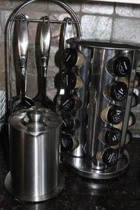 lot 76 image: Spinning spice rack, Hanging, Utensils and Stainless Steel pitcher