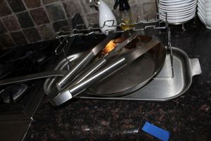 lot 79 image: BBQ, Stainless Steele Sheet, Skillet, Kabob Holder, thongs and knife