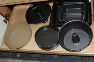 lot 81 image: Bakeware, Pampered Chef pan, and stoneware chicken roasting pan