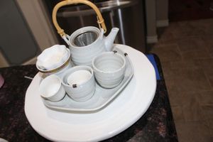 lot 90 image: Tea pot, cups platter and more