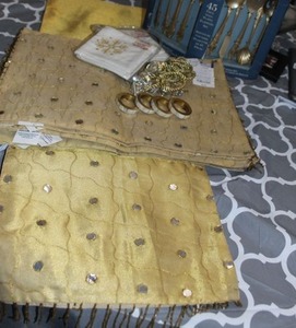 lot 106 image: Table linens, Runner, placemats and gold plated silverware set