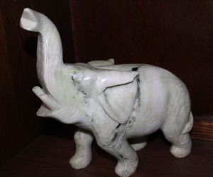 lot 17 image: White Hand Carved Marble Elephant