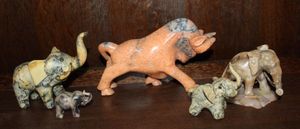 lot 22 image: Hand Carved Marble Elephants and a Bull From Spain