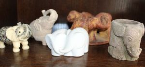 lot 31 image: Variety of Small Elephant Statutes, Some hand carved
