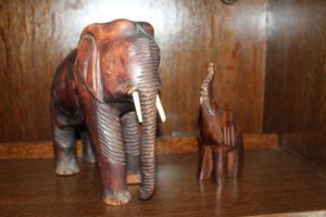 lot 43 image: Hand carved TeakMahogany Elephants