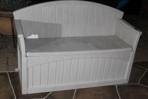 lot 129 image: Out Door Plastic Bench with Contents