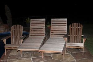 lot 133 image: Poolside Wooden Lounge Chairs and Chairs,,, needs refinished