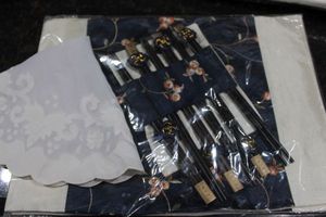 lot 108 image: Unused Place Setting Set ..includes Cloth Centrepiece, Place mats and Chopsticks for 4.