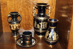lot 158 image: Three Greek Vases of Different Sizes and CupSaucer.  Handmade in Greece Designs made In 24 K Gold