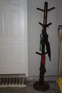 lot 188 image: Wood Coat Tree with Umbrellas, Approx 6 ft Tall