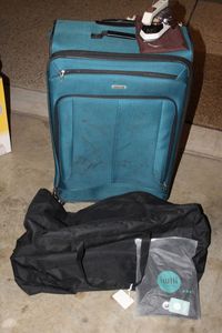 lot 192 image: Large Rolling Suitcase and Duffle Bags