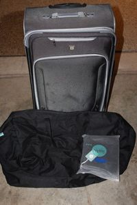 lot 195 image: Large Rolling Suitcase and Duffle Bags