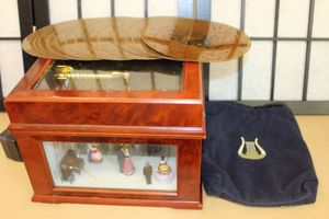lot 234 image: Mr. Christmas Mechanical Music Box With Many Songs Included
