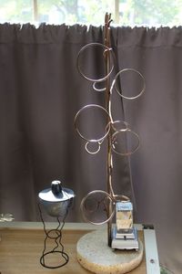 lot 238 image: Bottle Holder and Small tabletop tiki