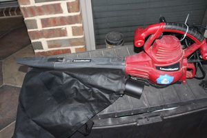 lot 138 image: Lawn master Blower and Extension Cord
