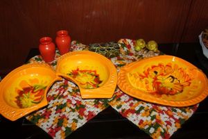 lot 315 image: Mid Century California Pottery Snack bowls and Ashtray, and Salt and Pepper Shakers Vintage Miniature Orange Vases, Trinket Box and more