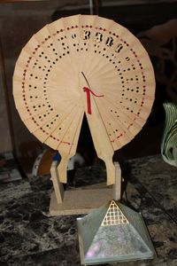 lot 333 image: Chinese Fan and Pyramid paperweight