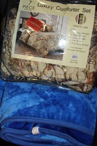 lot 111 image: King Size Animal Comforter, and large Plush Blue Blanket