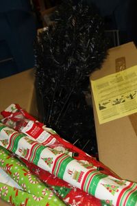 lot 214 image: Faux Black Christmas Tree and Wrapping Paper
