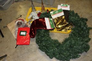 lot 215 image: Christmas Dcor, outdoor Flag, Stockings, Blinking Headbands, Snowflakes, Silver and Gold Led tabletop trees and Wreaths