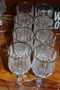 lot 291 image: Eight Cristal DArques Lead Crystal Wine Glasses with 24k gold Trim