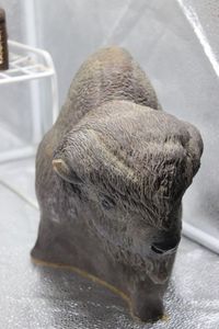 lot 101 image: Clay Bison Sculpture Signed