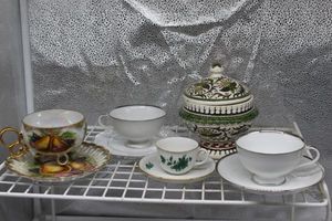 lot 53 image: Tea Cups and Saucers and hand painted lidded dish