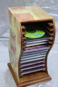 lot 110 image: Desk Top CDSoftware Holder with Music CDs