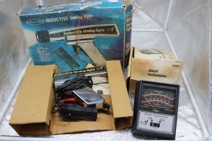 lot 126 image: Inductive timing light in original box and Dwell Tachometer in original box
