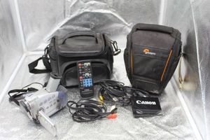 lot 134 image: Cannon 360x  Camcorder, with Accessories. This is not digital, Takes a tape