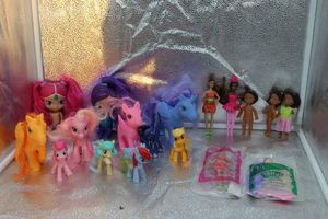lot 137 image: My Little Ponies and a variety of dolls