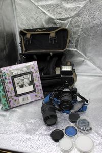 lot 148 image: Camera with accessories, photo album KR Super 2 with extra lenses and filters