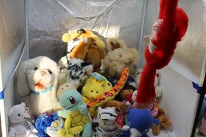 lot 180 image: Stuffed Animals with Hanging monkey