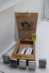 lot 165 image: Vintage Cigar box and collection of Zippo style lighters