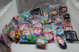 lot 103 image: Large quantity of unopened McDonalds toys