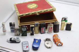 lot 104 image: Vintage Cigar box and collection of lighters