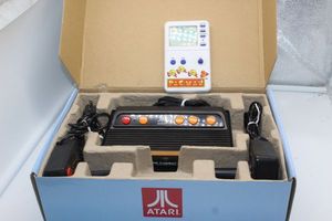 lot 13 image: Atari Game System, and Handheld Pacman