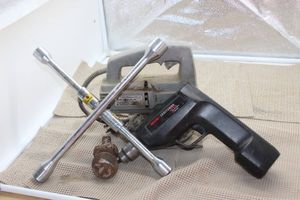 lot 206 image: Power Tools and 4 way, Craftsman battery powered drill no battery or charger, Mastercraft jigsaw and Trailer hitch ball