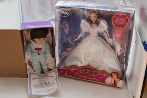 lot 37 image: Disney, Giselle Barbie, Enchanted and Collectable Ashton-Drake hand painted porcelain doll Ricky with certificate of authenticity