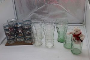 lot 209 image: Vintage collectable Glasses, 5 Pepsi Glasses, 4 Vintage Seven up glasses and 3 coke glasses with coca bear