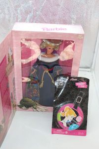 lot 210 image: Factory Sealed Barbie Doll and luggage tag