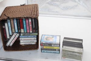 lot 270 image: Wicker Basket with hinged lid full of cassette tapes