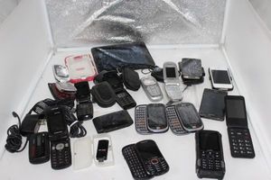 lot 224 image: Vintage Cellphones and tablets as shown in photos