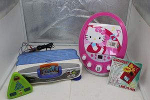 lot 40 image: Vetch Game System, Hello Kitty Karaoke Player and CD