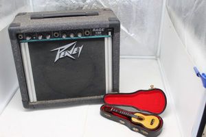 lot 28 image: Guitar Amp and Miniature Violin